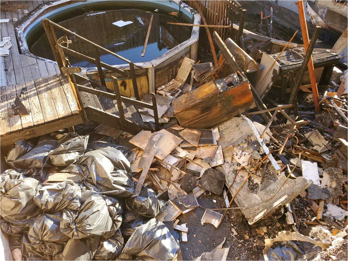Flood damage repair — waterlogged flooring and structural damage
